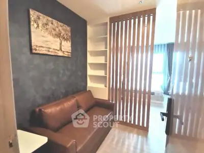 Cozy living room with modern decor and stylish partition