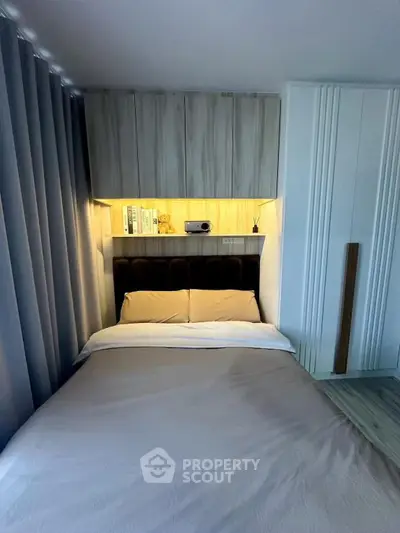 Cozy modern bedroom with built-in storage and ambient lighting