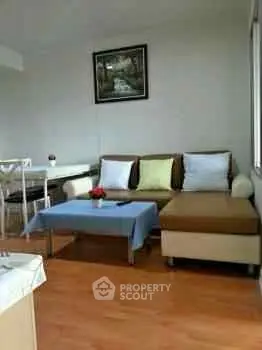 Cozy living room with modern sofa and wooden flooring