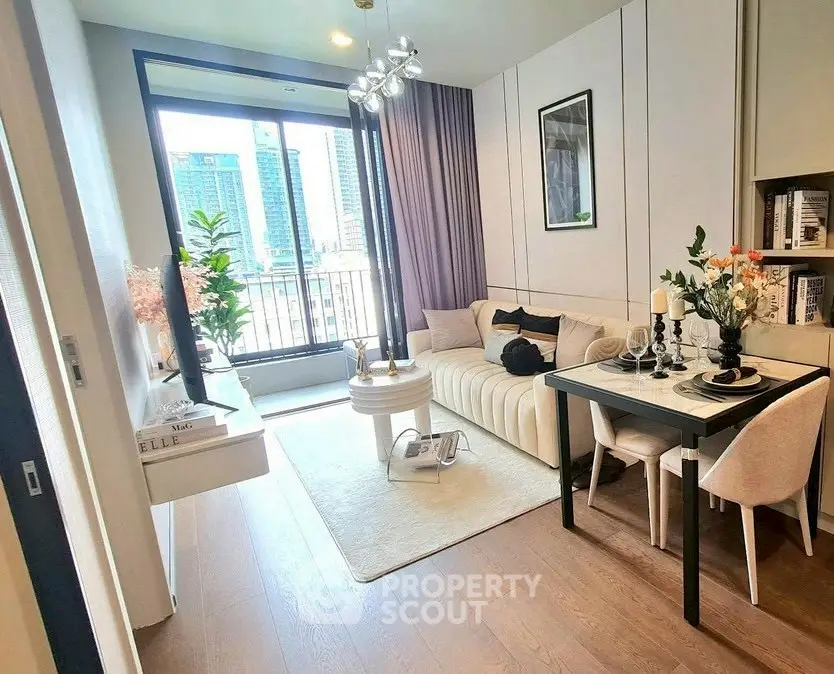 Modern living room with elegant decor and city view balcony