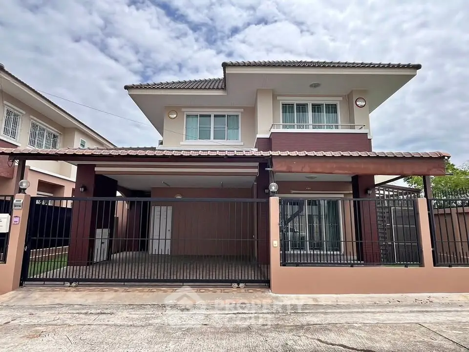 Elegant two-story house with spacious driveway and modern design in a serene neighborhood.