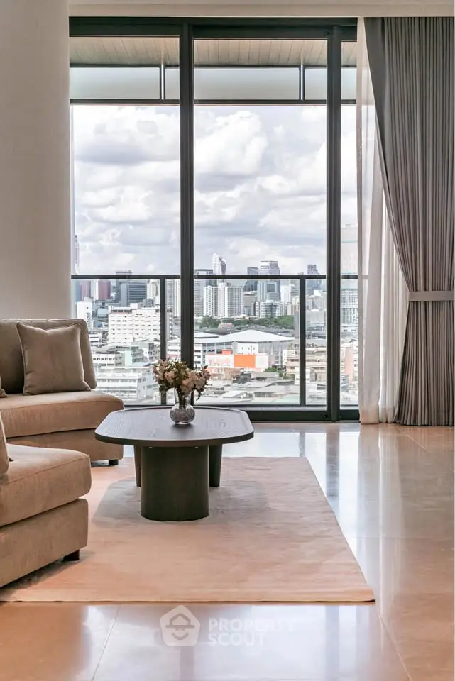Luxurious living room with stunning city view and elegant decor