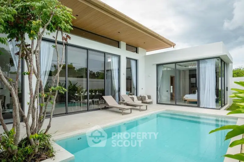 Luxurious modern villa with private pool and spacious outdoor area, perfect for relaxation and entertainment.
