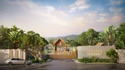 Luxurious gated entrance of The Tales with lush greenery and scenic mountain backdrop.