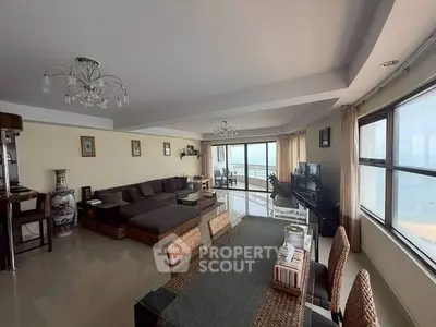 Spacious living room with ocean view and elegant decor