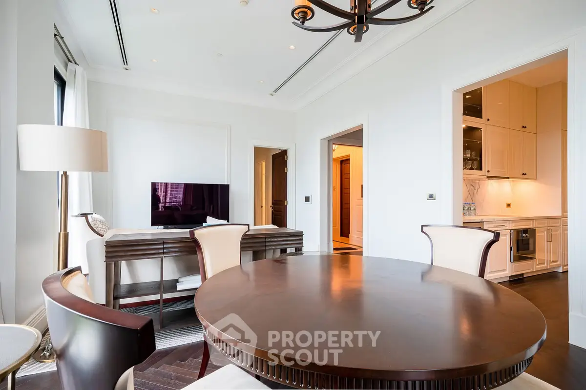Luxurious living room with elegant dining area and modern kitchen