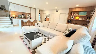 Spacious modern living room with elegant decor and cozy seating area