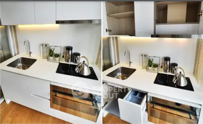 Modern kitchen with sleek white cabinets and built-in appliances, featuring a stylish open layout.