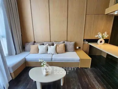 Modern living room with stylish wooden paneling and cozy seating area