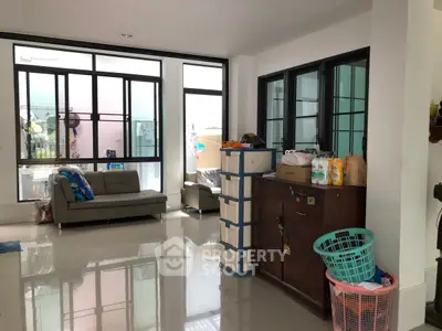 Spacious living room with modern windows and ample natural light