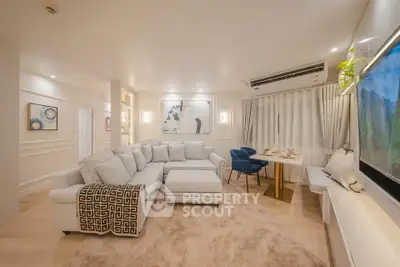 Luxurious living room with plush seating and elegant decor, perfect for relaxation and entertainment.