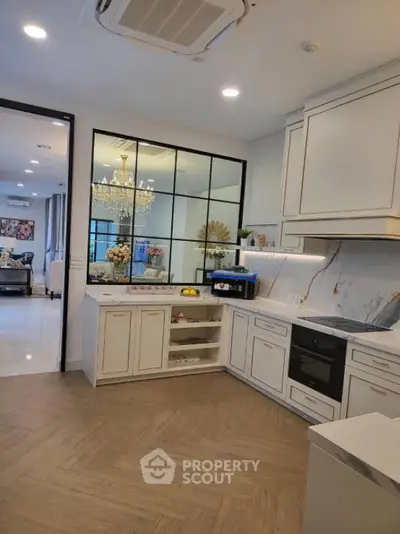 Luxurious modern kitchen with elegant cabinetry and open layout