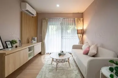 Modern living room with stylish decor and natural light