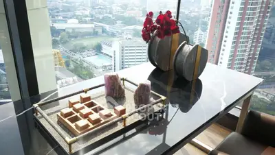 Luxurious high-rise apartment with stunning city view and elegant interior decor