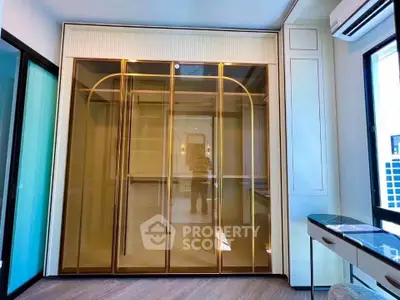 Luxurious bedroom with elegant glass wardrobe and modern decor
