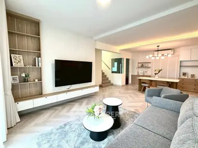 Spacious modern living room with stylish decor and open layout