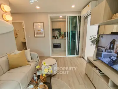 Modern living room with open kitchen and stylish decor