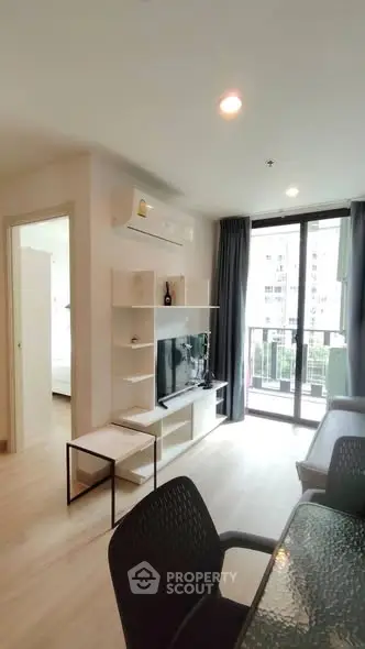 Modern living room with balcony view in a stylish apartment
