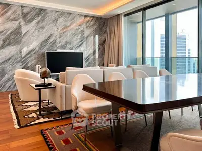 Luxurious modern living room with elegant decor and city view balcony.