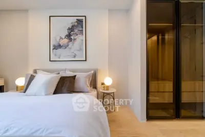 Luxurious modern bedroom with elegant decor and ambient lighting