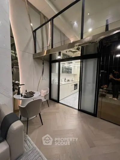 Modern loft apartment with open kitchen and stylish dining area