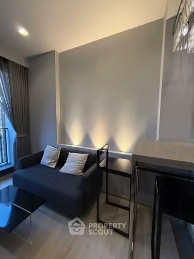 Modern living room with sleek furniture and ambient lighting, perfect for urban living.