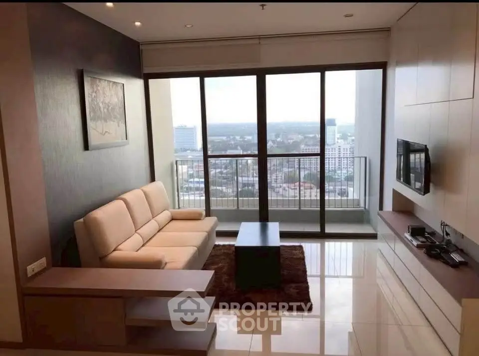 Modern living room with stunning city view and sleek furniture