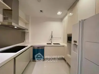 Modern kitchen with sleek appliances and minimalist design