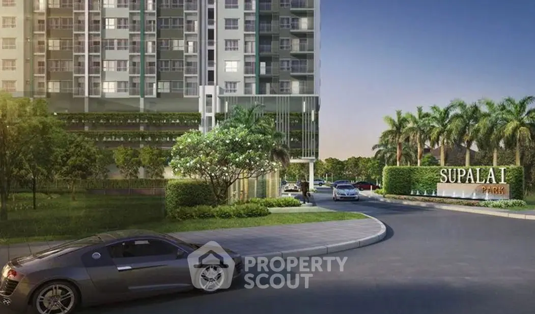 Luxurious condo entrance with lush landscaping and modern architecture at Supalai Park.