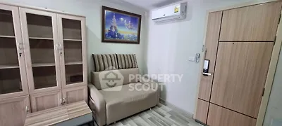 Cozy living room with modern furniture and air conditioning in a stylish apartment.