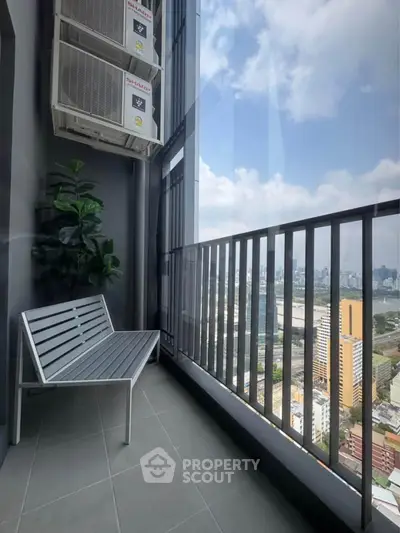 Modern balcony with city view, featuring sleek bench and air conditioning units, perfect for urban living.