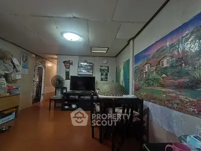 Cozy living room with eclectic decor and wall art