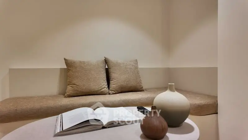 Cozy minimalist living room with neutral tones and stylish decor