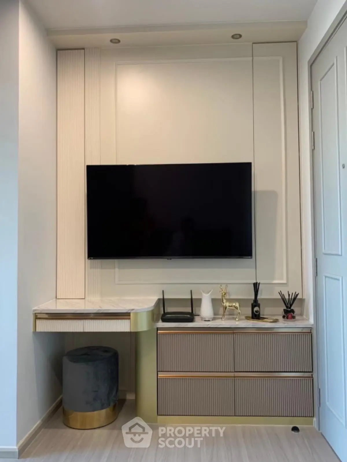 Modern living room with stylish TV setup and elegant decor