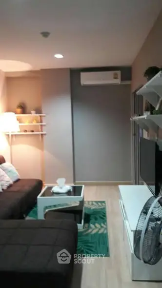 Cozy living room with modern decor and air conditioning