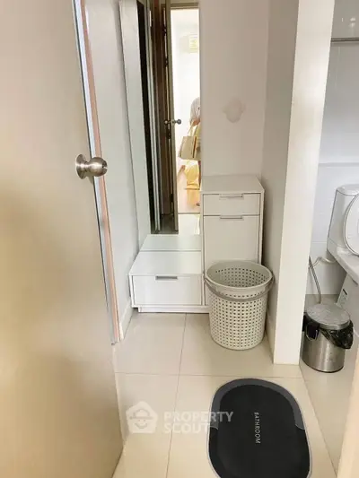 Compact bathroom with modern fixtures and storage solutions