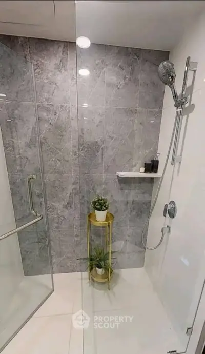 Modern bathroom with sleek shower design and elegant tile work