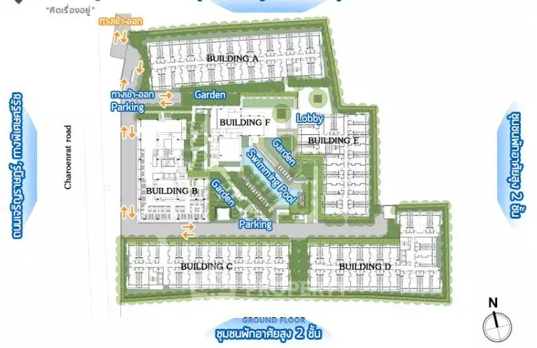 Detailed schematic plan of a residential complex with multiple buildings, gardens, and parking areas.