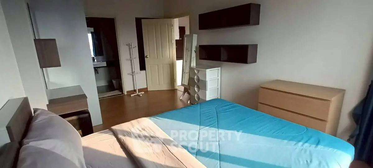 Cozy bedroom with modern furniture and natural light