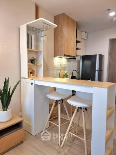 Modern kitchen with stylish breakfast bar and sleek appliances