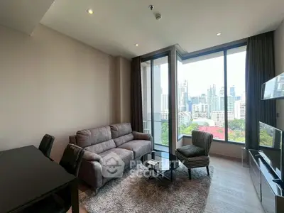 Modern living room with city view, stylish furniture, and natural light