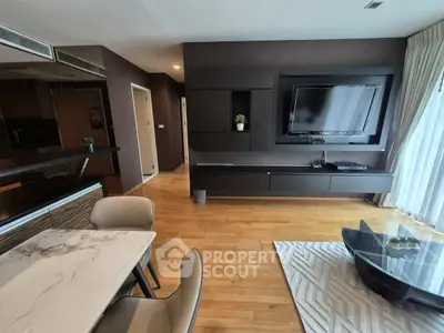 Modern living room with sleek TV setup and stylish furniture
