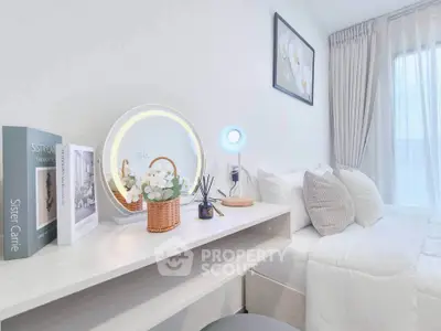 Elegant bedroom with modern decor, featuring a cozy bed, stylish vanity, and soft lighting for a serene ambiance.