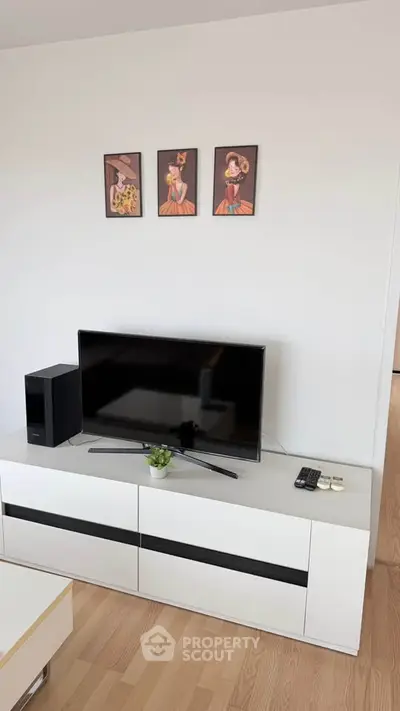 Modern living room with sleek TV setup and stylish decor