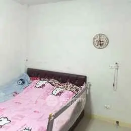 Cozy bedroom with unique decor and comfortable bedding