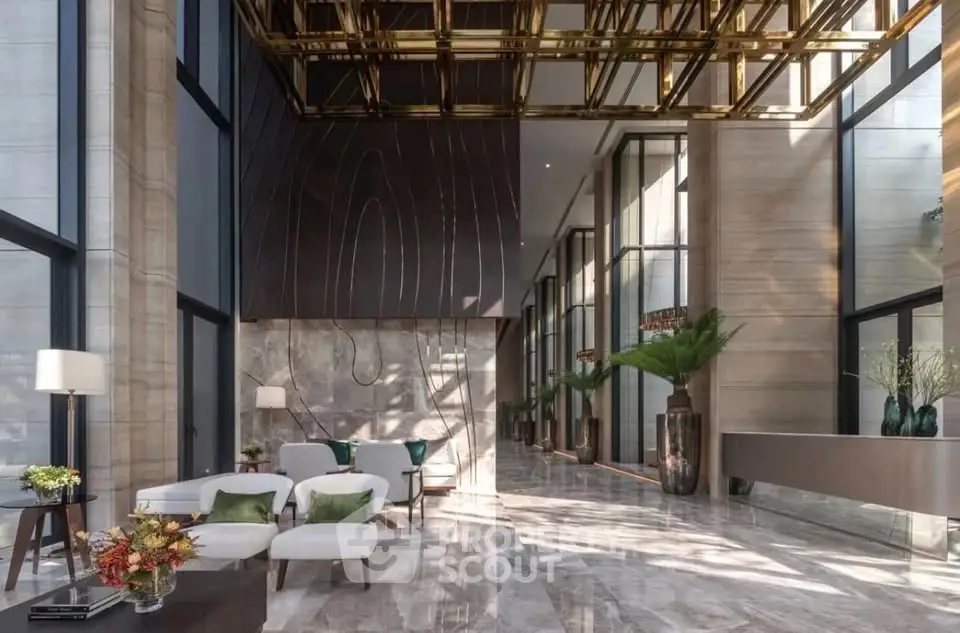 Luxurious modern building lobby with high ceilings and elegant decor