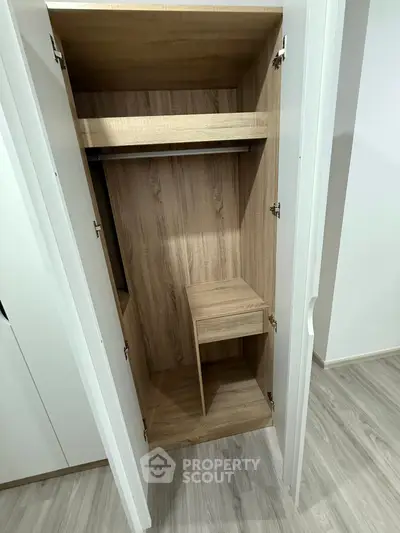 Spacious wooden wardrobe with modern design and ample storage space
