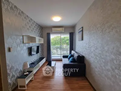 Modern living room with stylish decor and balcony view