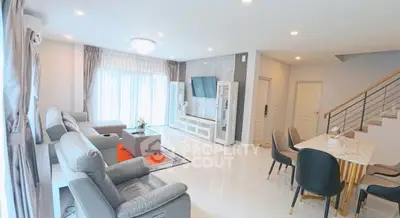 Spacious modern living room with elegant decor and ample natural light