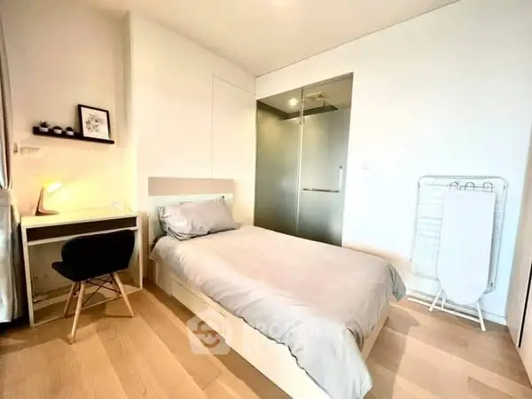 Modern minimalist bedroom with sleek design and natural light